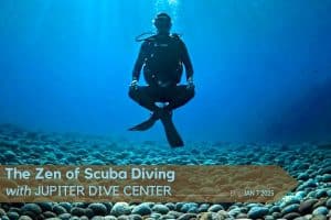 Diver underwater in zen position